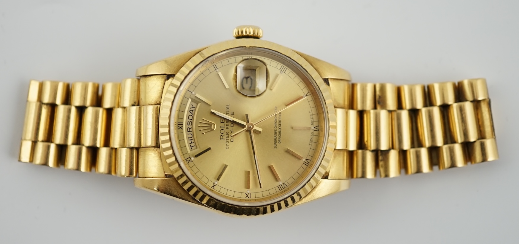 A gentleman's late 1980's 18ct gold Rolex Oyster Perpetual Day/Date wrist watch, on an 18ct gold Rolex bracelet with deployment clasp